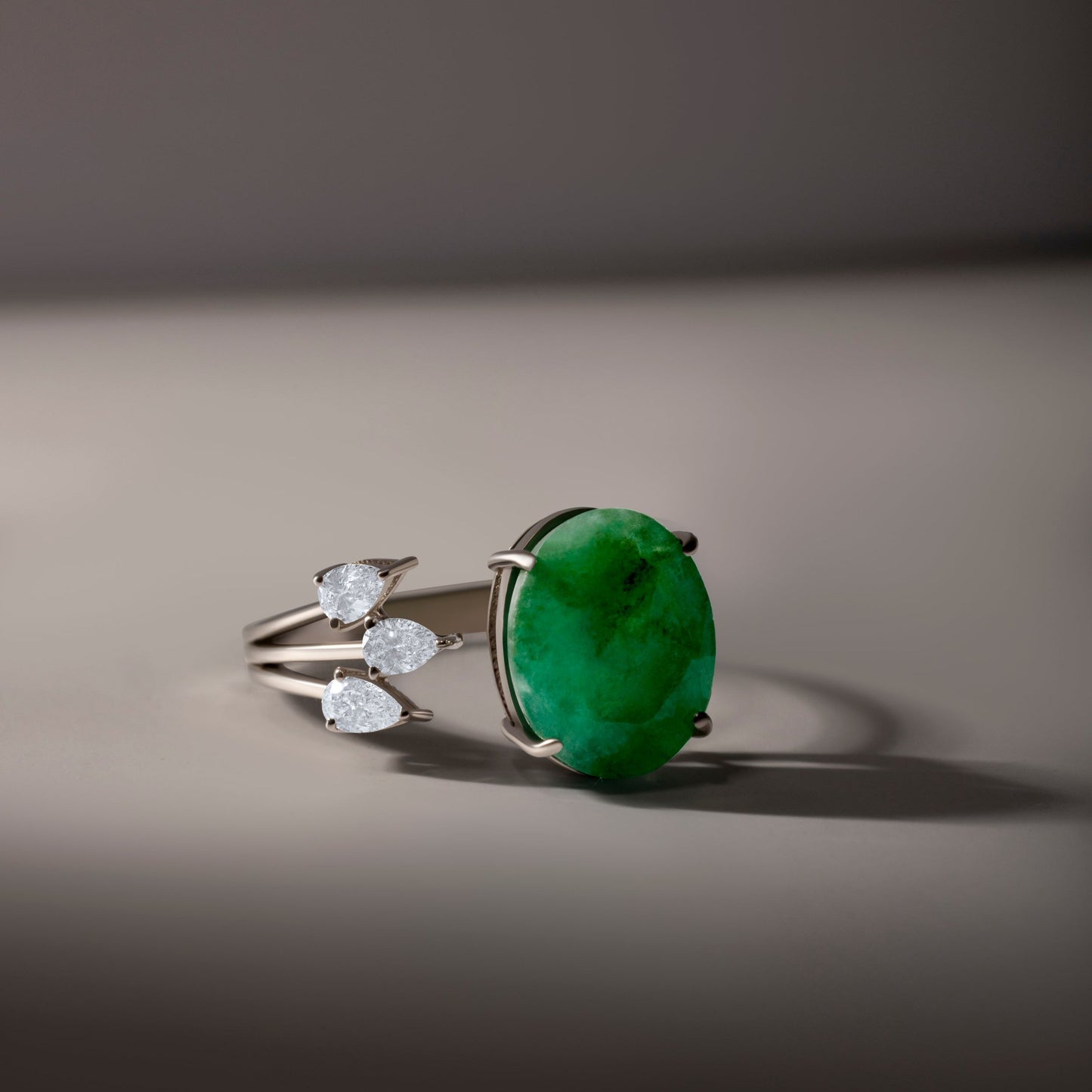 DIAMOND STUDDED LEAF EMERALD WHITE GOLD RING