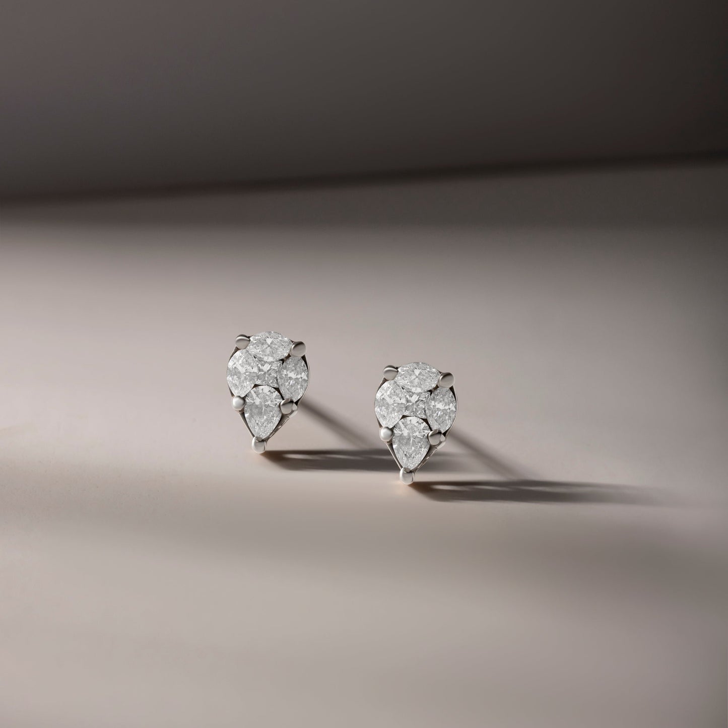 TWINKLING TEARDROP DIAMOND STUDDED YELLOW GOLD EARRINGS