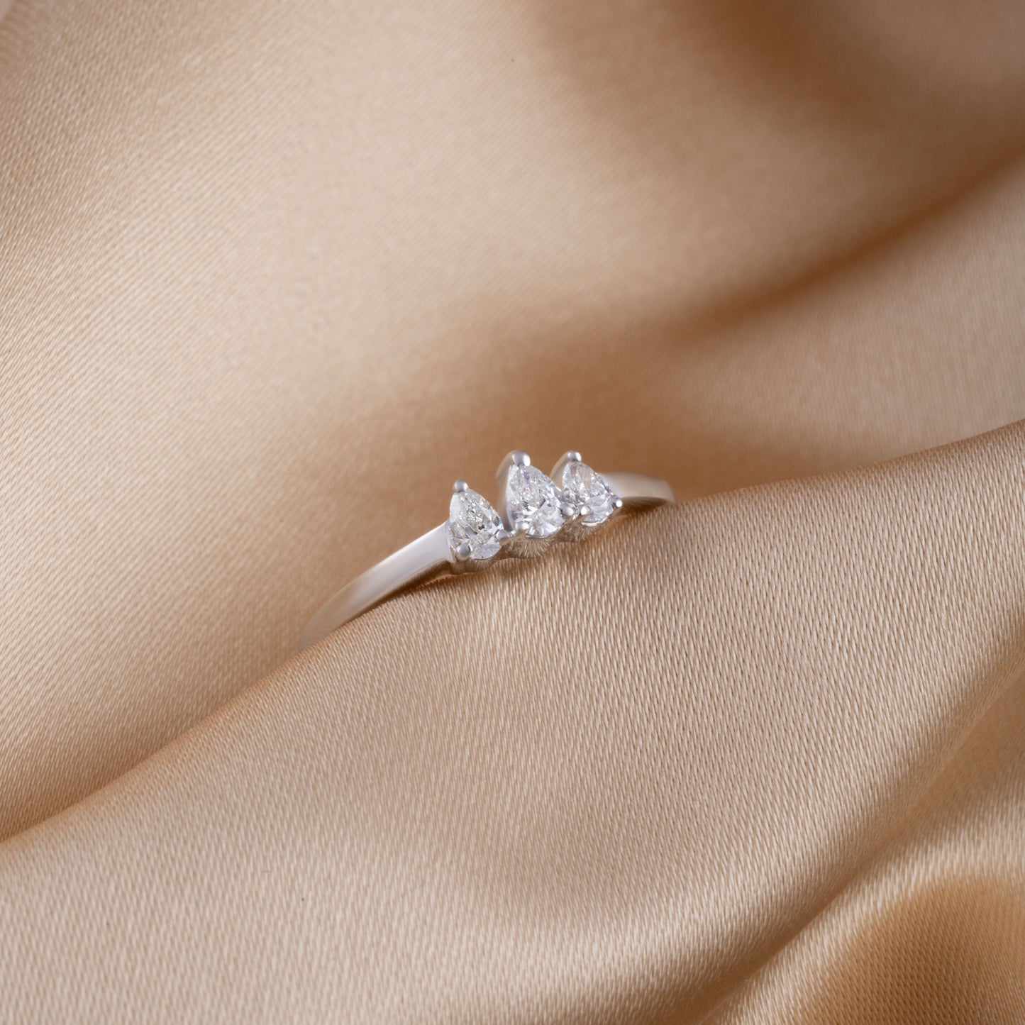 PEAR COLLISION DIAMOND RING